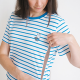 Woman wearing the Miffy striped breastfeeding T-shirt with hidden nursing zips